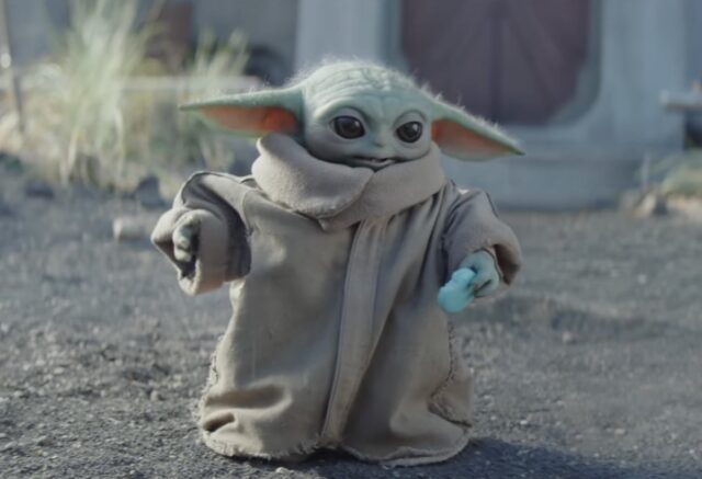 AI生成的《曼达洛人与古古》电影海报概念图，展现曼达洛盔甲与古古的细节